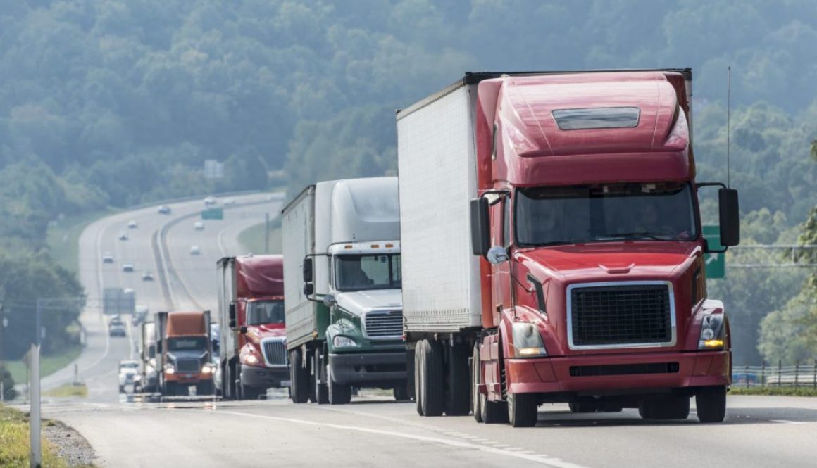 32567551 - big truck convoy traveling on highway