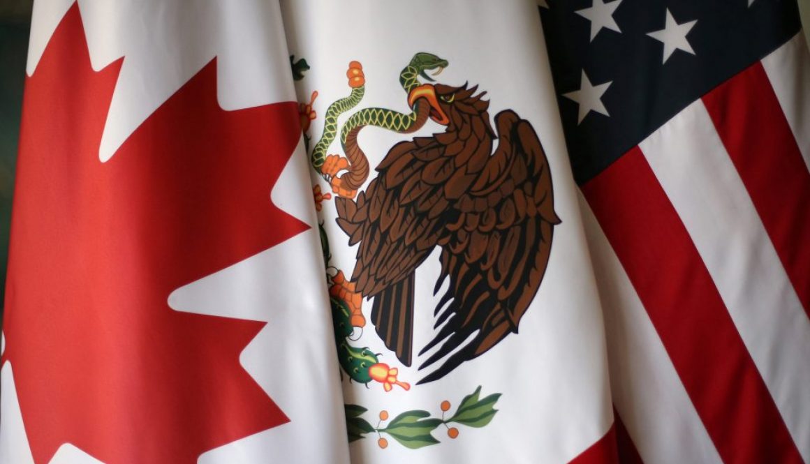 Flags are pictured during the fifth round of NAFTA talks involving the United States, Mexico and Canada, in Mexico City